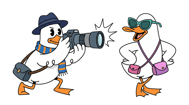 Two ducks taking a photo